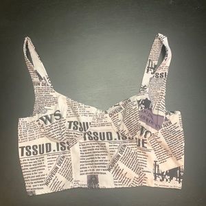 News print crop tank with back zipper.